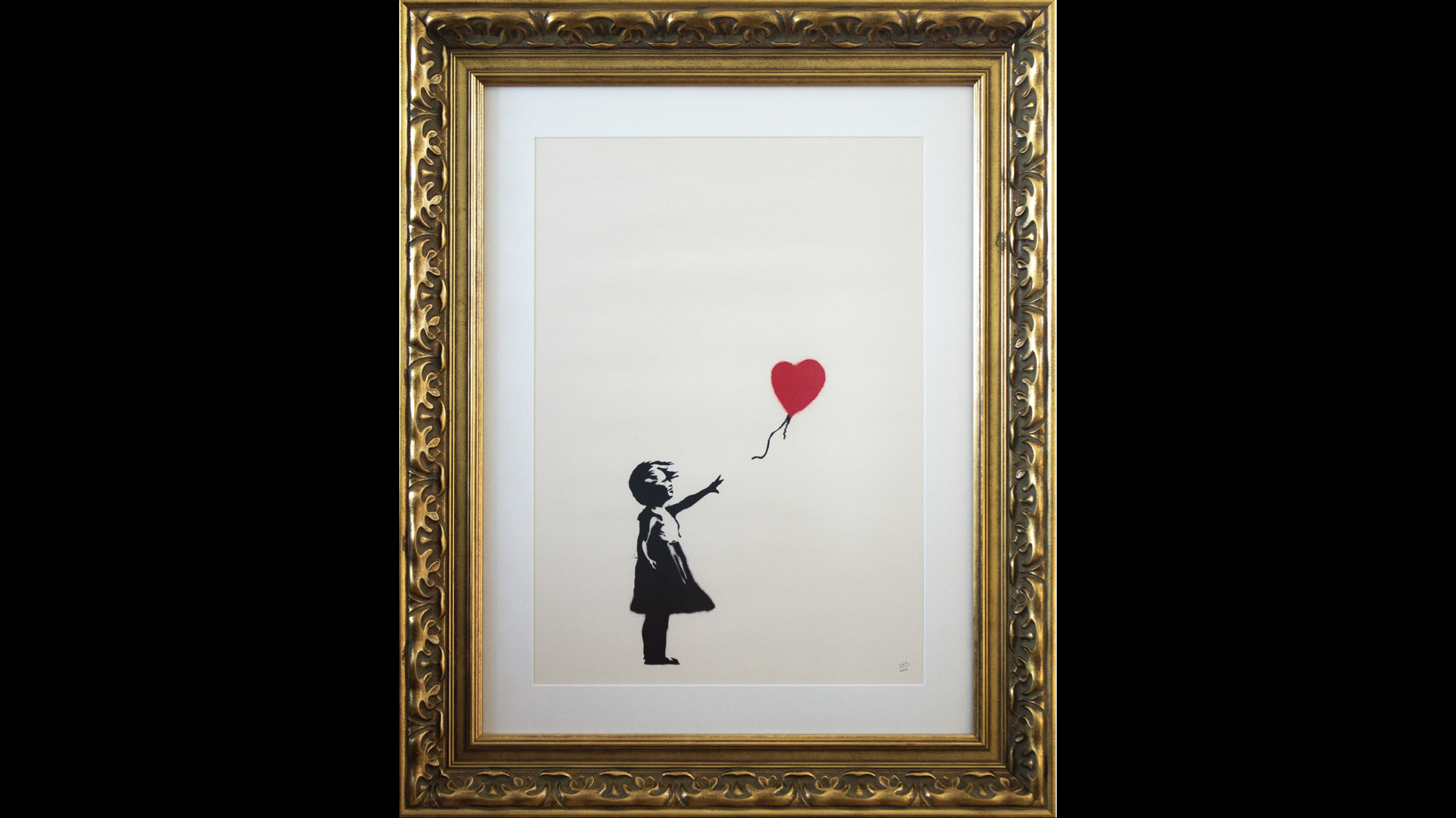 Rubano stampa 'Ragazza con Palloncino' di Banksy, incriminate 2 persone